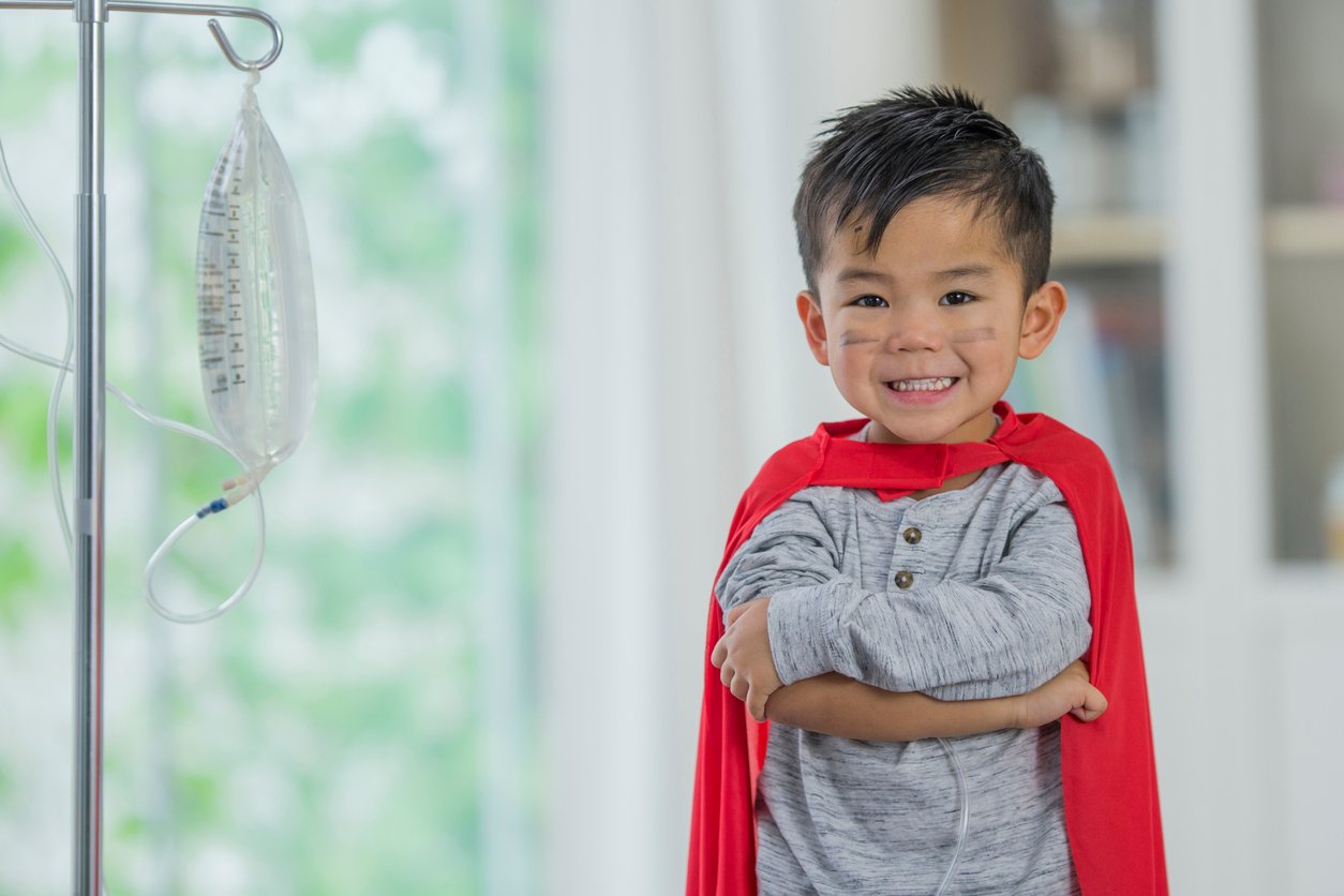 boy-with-cape-and-iv-drip