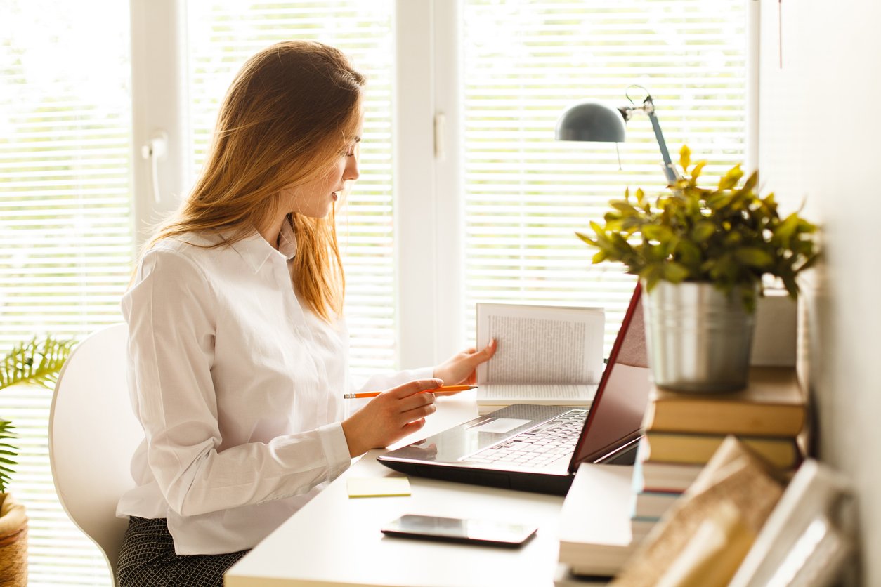 girl-using-laptop-working-from-home