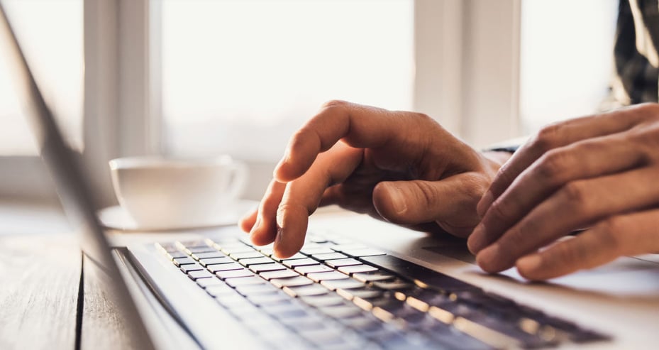 person’s-hands-typing-on-a-laptop-persons-hands-typing-on-a-laptop